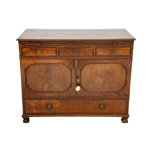 662 - A George III mahogany side cabinet/low press. Fitted with a pull-out slide above three drawers, all ... 