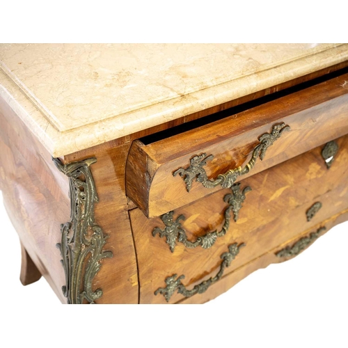 663 - A Louis XV style kingwood and fruitwood marquetry marble top bombe commode. With brass mounts and th... 