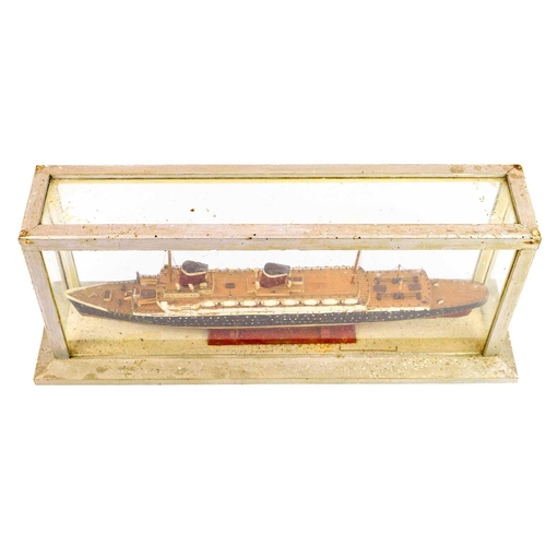 67 - A scratch built model of a S S America. In a glazed case, dimensions of case are 21cm width 53.5cm d... 