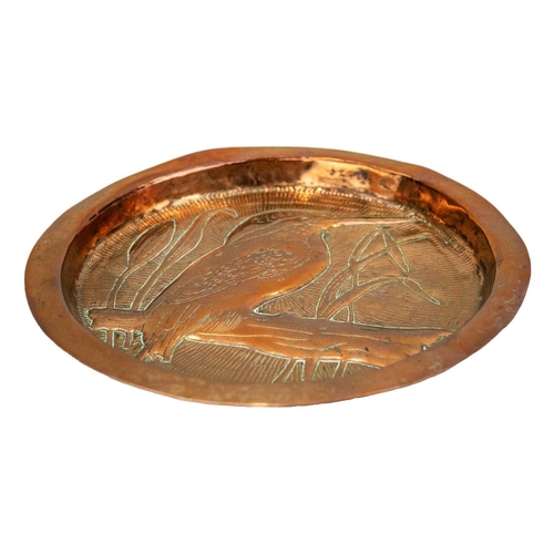 68 - An Arts and Crafts copper dish Decorated in repousse and chased with a perched Kingfisher, stamped H... 