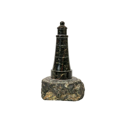 8 - A Cornish serpentine turned model of a lighthouse. Height 19cm, together with a serpentine ash tray ... 