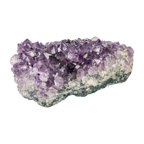 82 - An amethyst geode cluster of large proportions. With well formed points of varying sizes, width 28cm... 