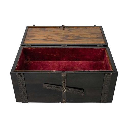 92 - An Indo-Portuguese coromandel iron bound puzzle casket circa 1900. With a hidden spring catch pull o... 