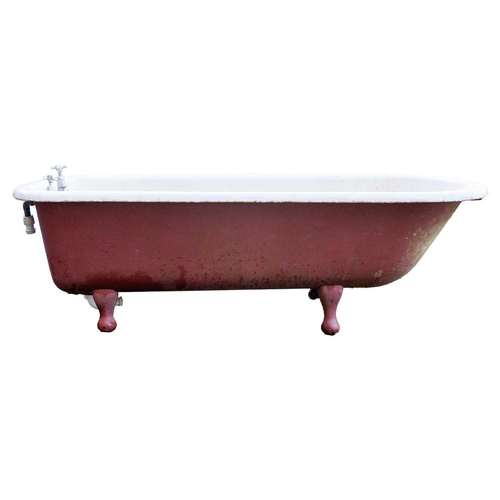 97 - A cast iron roll top bath. Height 55cm (excluding taps), width 180cm, depth 73cm (at widest point).