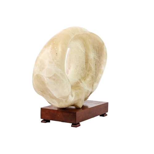 323 - Max BARRETT (1937-1988) Untitled Alabaster form with wooden stand, height 28cm, width 32cm.