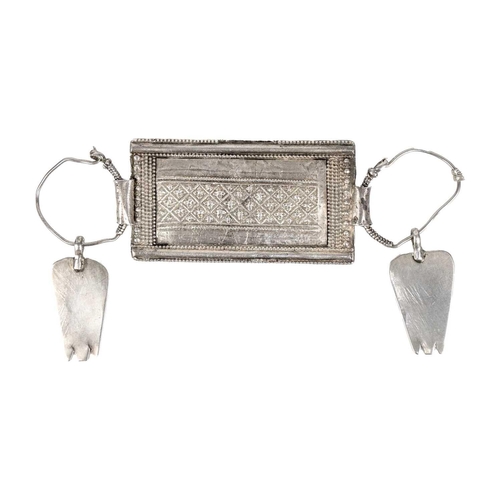 102 - An Omani silver rectangular amulet with chain. Total length 84cm, amulet 8.5 x 4.5cm.