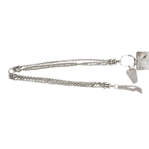 102 - An Omani silver rectangular amulet with chain. Total length 84cm, amulet 8.5 x 4.5cm.