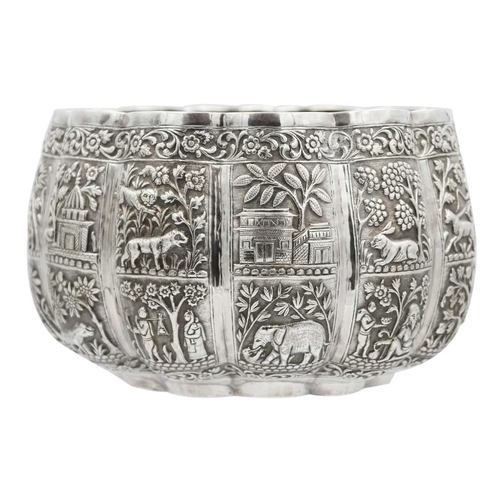 105 - A Burmese silver thabeik lobed bowl, early 20th century. Of lobed form, with twenty-four panels repo... 