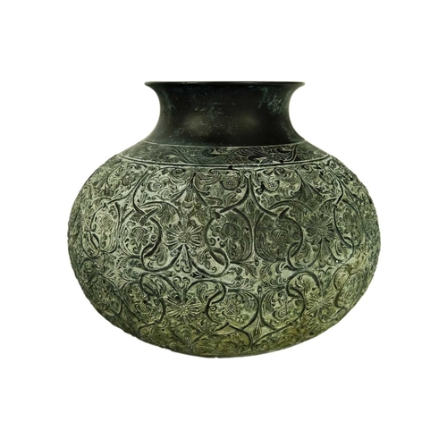 107 - An Indian bronze globular vase, 19th century. Height 19.5cm, width 19cm, a Carioware brass and silve... 