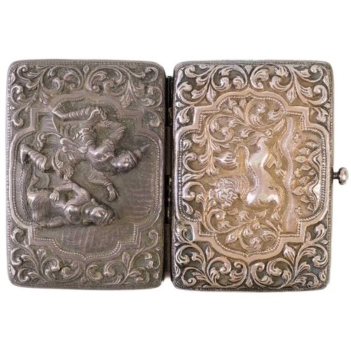 108 - A Burmese silver cigarette case. Repousse decorated with figures and scrolling leafy vines, 6 x 8.3c... 