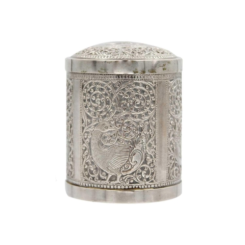 112 - An Indian silver cannister, early 20th century. The cover repousse decorated with an elphant within ... 