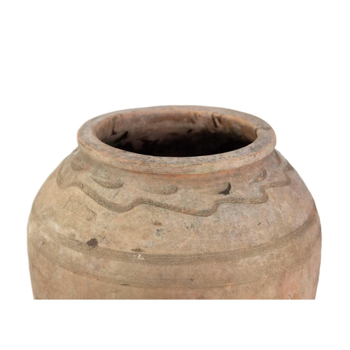 117 - A terracotta olive jar on metal stand. Height 70cm, width 37cm.