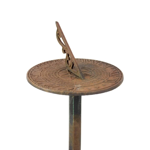 123 - A reproduction cast iron sundial on stand. Height 81.5cm, diameter 37.5cm.