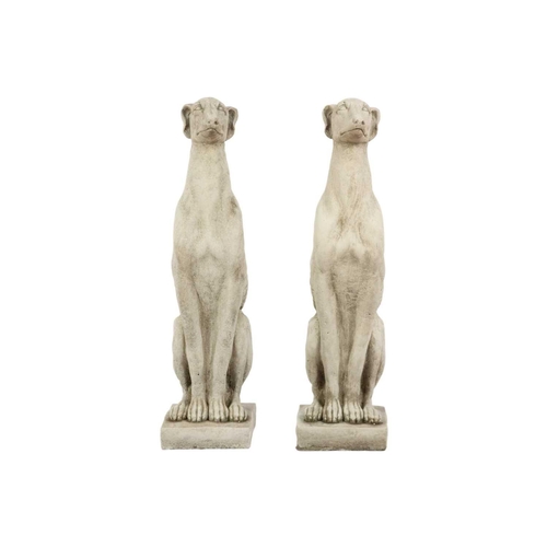 126 - A pair of reconstituted stone garden ornaments in the form of whippets. Height 56cm, width 14.5cm, d... 