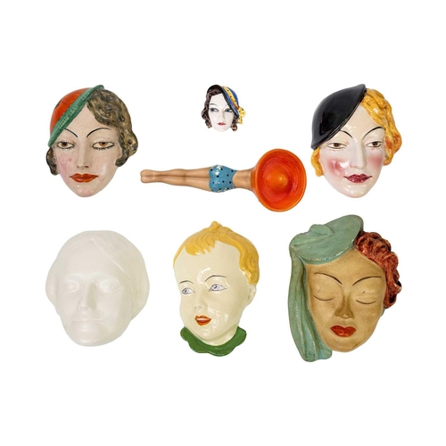 158 - A collection of Art Deco six wall masks. Including a Czechoslovakian mask of a child, an Arthur Wood... 