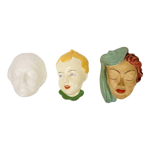 158 - A collection of Art Deco six wall masks. Including a Czechoslovakian mask of a child, an Arthur Wood... 