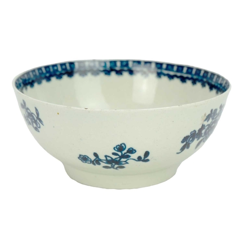 175 - A Liverpool blue and white porcelain bowl. Circa 1780, with blue and white floral painted decoration... 