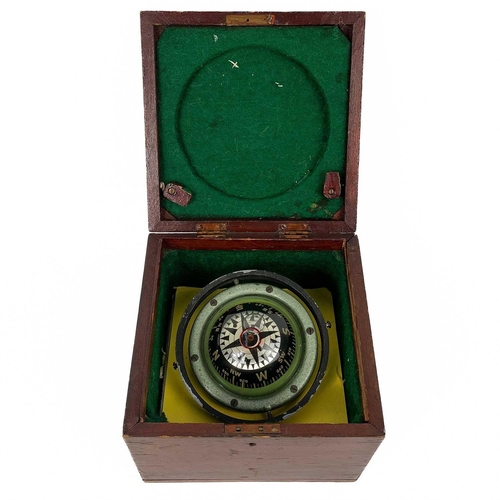 19 - A boxed Domed Compass and spirit level. Late 20th Century, card diameter 8cm.