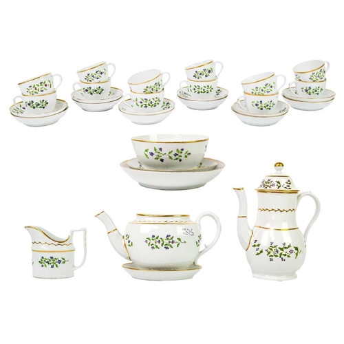 201 - An English porcelain part tea and coffee service. Decorated with speedwell and highlighted with gilt... 