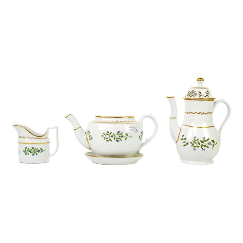 201 - An English porcelain part tea and coffee service. Decorated with speedwell and highlighted with gilt... 