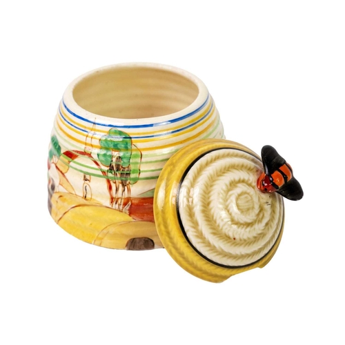 207 - An unusual Clarice Cliff Orange Cottage Roof pattern beehive honeypot. Also with banded decoration, ... 