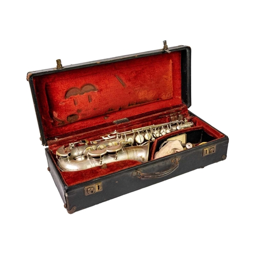 21 - A French made Predominant Alto Saxophone sold by Boosey & Hawkes. Serial No. 10911, with mouth piece... 