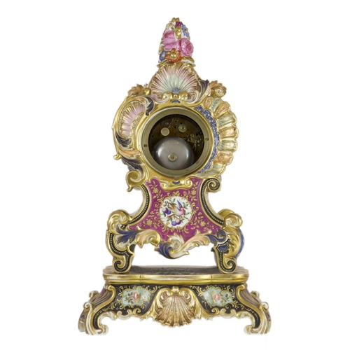 232 - A Paris porcelain mantel clock, 19th century. On stand, height 50cm, width 28.5cm.