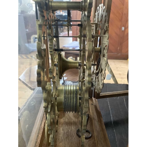 233 - A Victorian brass skeleton clock. Inscribed 'Bianchi, Grovenor Road, Tunbridge Wells', with a single... 