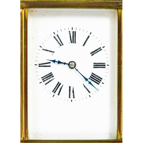 237 - A French brass carriage clock. Striking on a gong, with winding key, height 17cm.