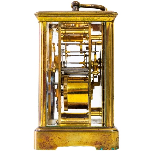 237 - A French brass carriage clock. Striking on a gong, with winding key, height 17cm.