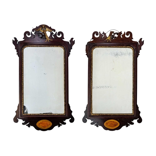 245 - A pair of Georgian design fretwork pier mirrors 19th century, each with gilt disheveled bird crests,... 