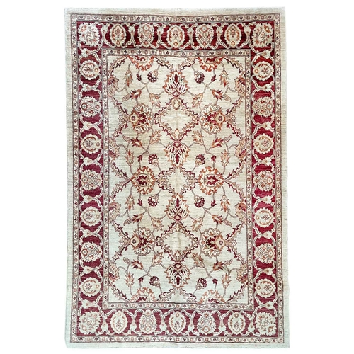 278 - A Ziegler design Chobi carpet. The ivory field with an all over design of large palmettes and leafy ... 