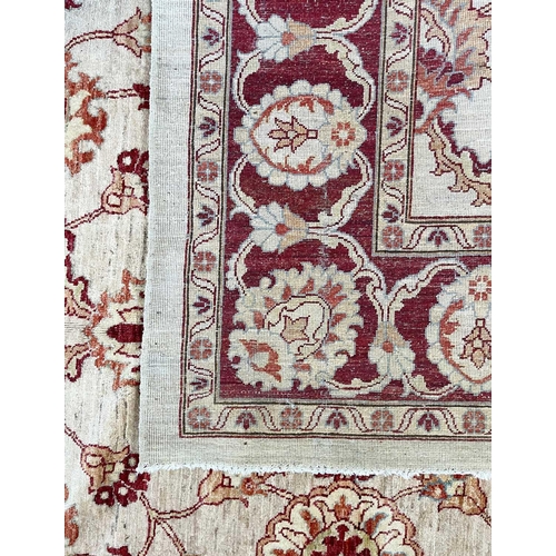 278 - A Ziegler design Chobi carpet. The ivory field with an all over design of large palmettes and leafy ... 