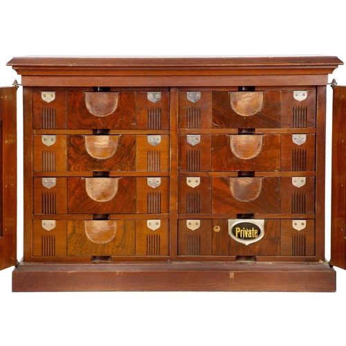 286 - A mahogany solicitors cabinet, early 20th century. The pair of panelled doors opening to reveal eigh... 