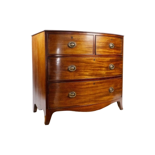 297 - A Regency mahogany bow front chest of drawers. With two short and two long drawers, on splay feet, h... 