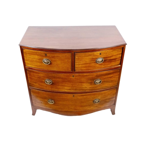 297 - A Regency mahogany bow front chest of drawers. With two short and two long drawers, on splay feet, h... 