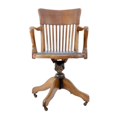 298 - An oak swivel office chair, circa 1920. Height 89cm, width 54cm; and a Victorian mahogany hall chair... 