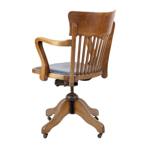 298 - An oak swivel office chair, circa 1920. Height 89cm, width 54cm; and a Victorian mahogany hall chair... 