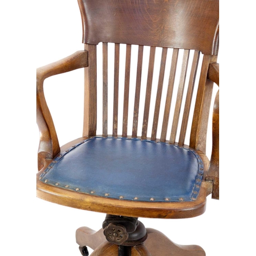 298 - An oak swivel office chair, circa 1920. Height 89cm, width 54cm; and a Victorian mahogany hall chair... 