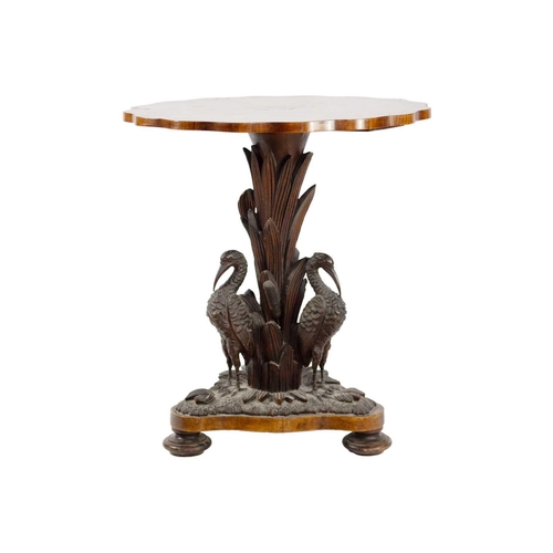 299 - An early Victorian walnut and oak centre table.. In the manner of Morant & Co, with a retailers pape... 