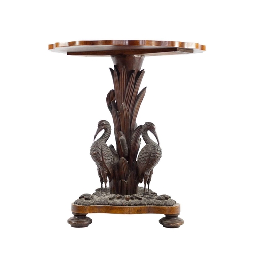 299 - An early Victorian walnut and oak centre table.. In the manner of Morant & Co, with a retailers pape... 