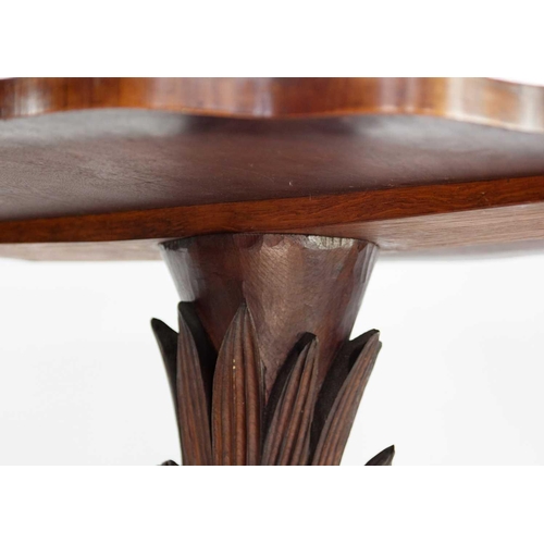 299 - An early Victorian walnut and oak centre table.. In the manner of Morant & Co, with a retailers pape... 