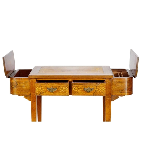 301 - An Edwardian inlaid rosewood lady's writing desk. With a central leather inset flanked by two hinged... 