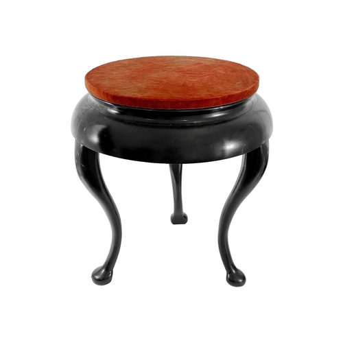 307 - An ebonised display stand, 20th century. With three cabriole legs, height 55cm, diameter of red velv... 