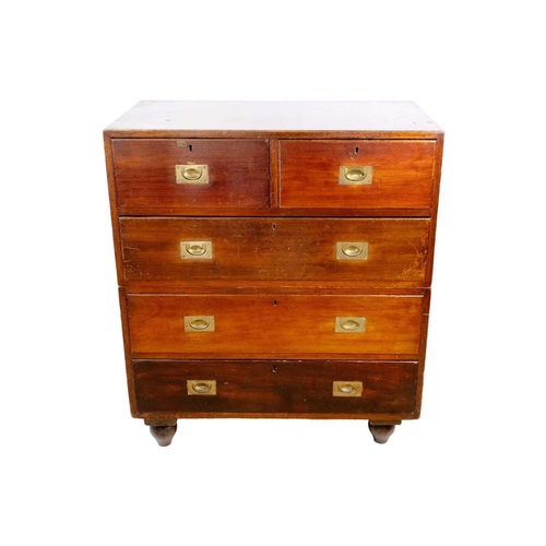 308 - A Victorian mahogany campaign chest. With two short and three long drawers, on bun feet, height 105c... 