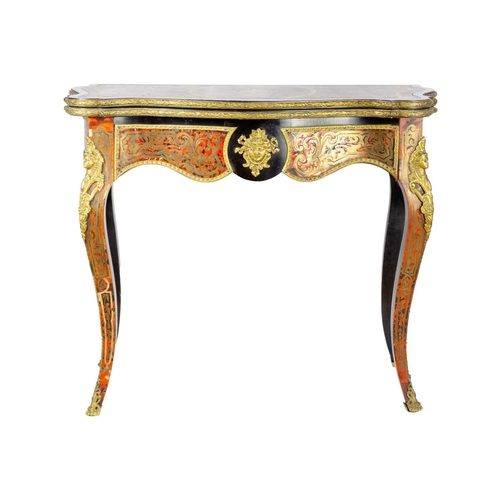 309 - A French Boulle fold over serpentine card table, 19th century. In the Louis XV style, with leather i... 