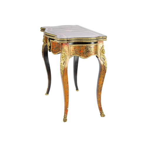 309 - A French Boulle fold over serpentine card table, 19th century. In the Louis XV style, with leather i... 