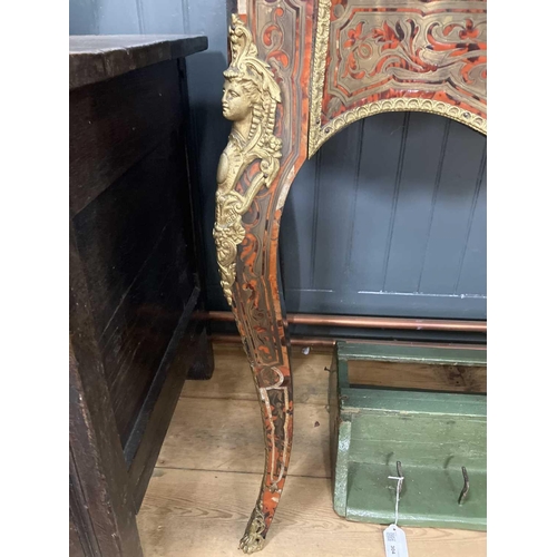 309 - A French Boulle fold over serpentine card table, 19th century. In the Louis XV style, with leather i... 