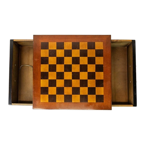 37 - A Staunton pattern ebonised and boxwood chess set, and a small chess table. The unweighted set in or... 