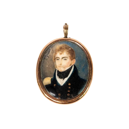 41 - A miniature portrait of a naval officer. Early 19th century, in a gold coloured oval frame, 4.7X3.6c... 